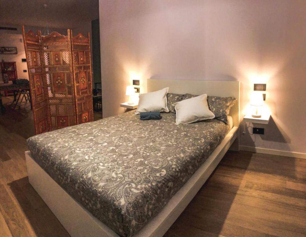 מיטה או מיטות בחדר ב-Casa Rita