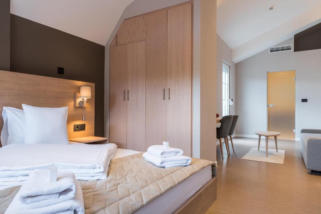 Postel nebo postele na pokoji v ubytování Emilia Lux Rooms