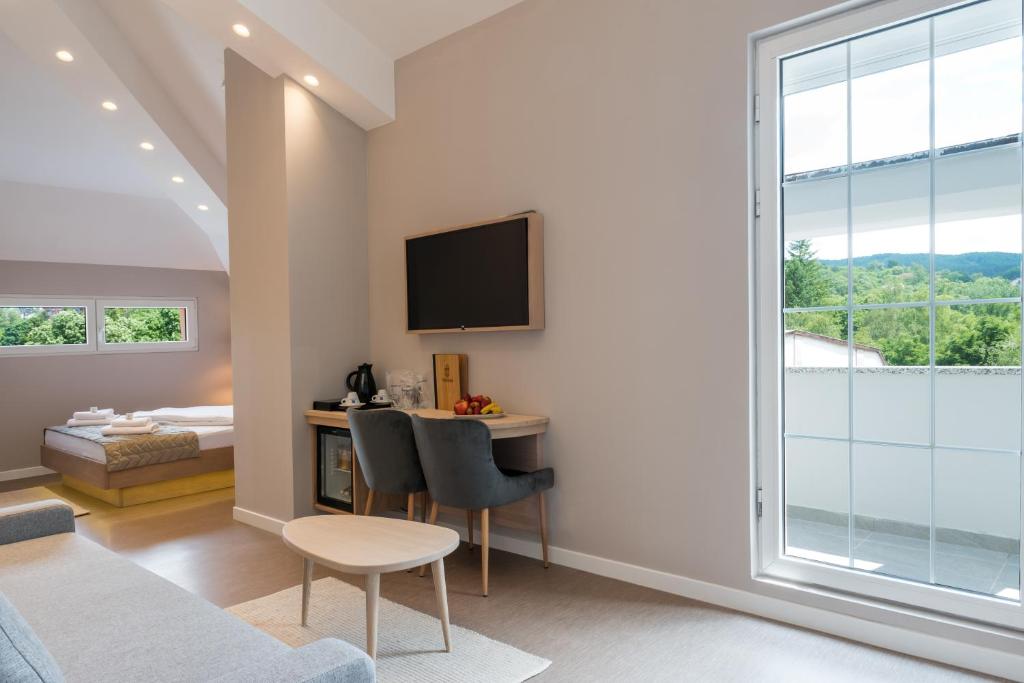 Postel nebo postele na pokoji v ubytování Emilia Lux Rooms