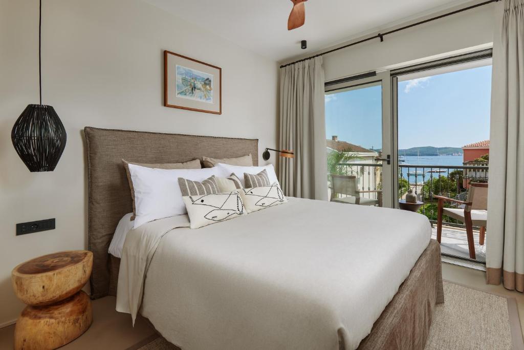 Postel nebo postele na pokoji v ubytování Casa Manor Boutique Hotel