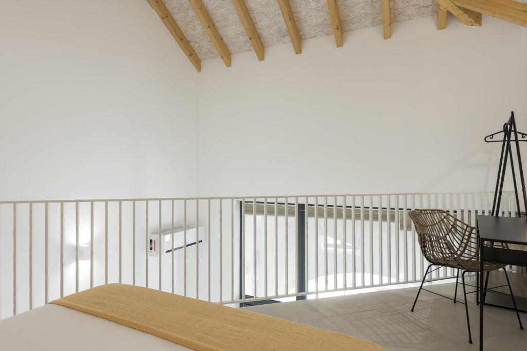 Postel nebo postele na pokoji v ubytování Madalena Village 1 - City centre by HD PROPERTIES