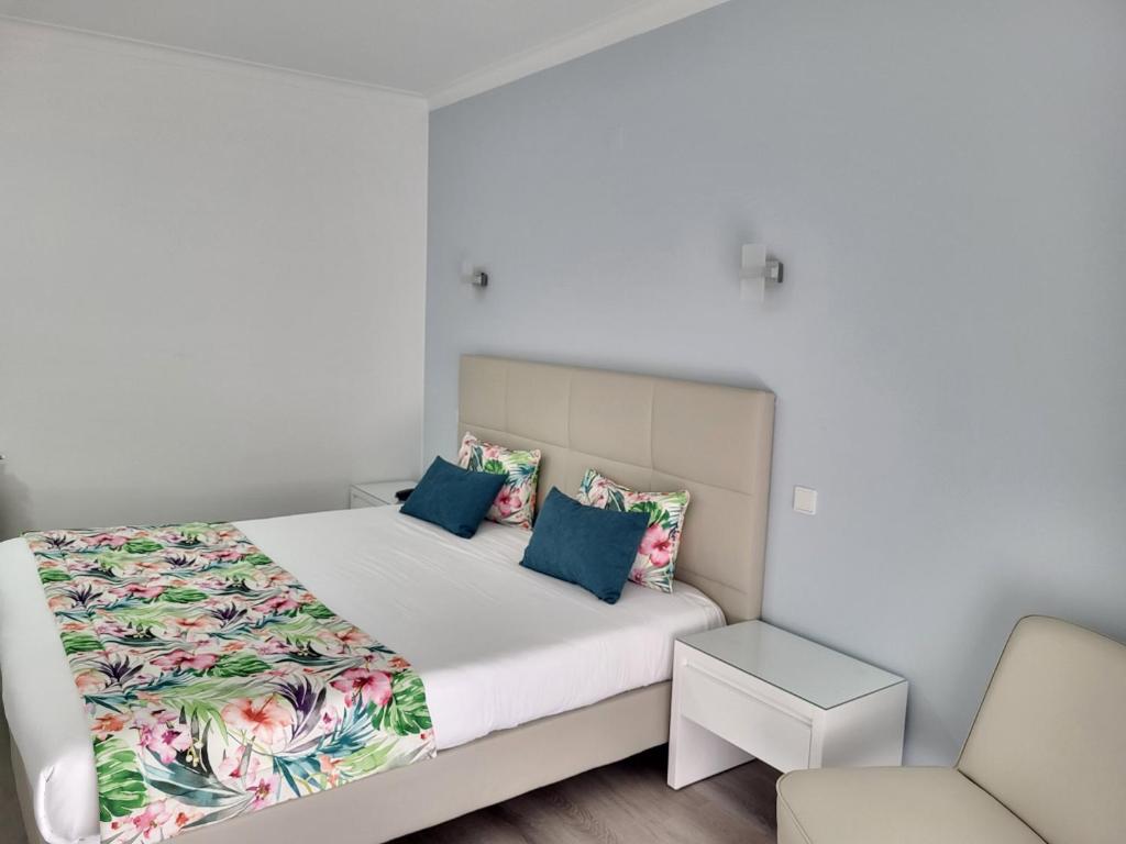Cama ou camas em um quarto em Hotel Ancora Mar