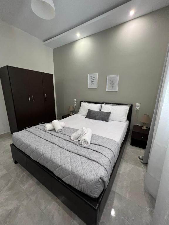 Postel nebo postele na pokoji v ubytování Korithis Apartment