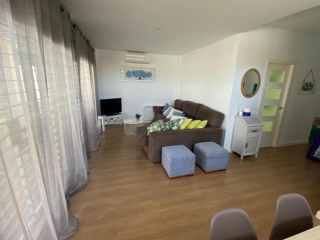 Televízia a/alebo spoločenská miestnosť v ubytovaní villa amavida