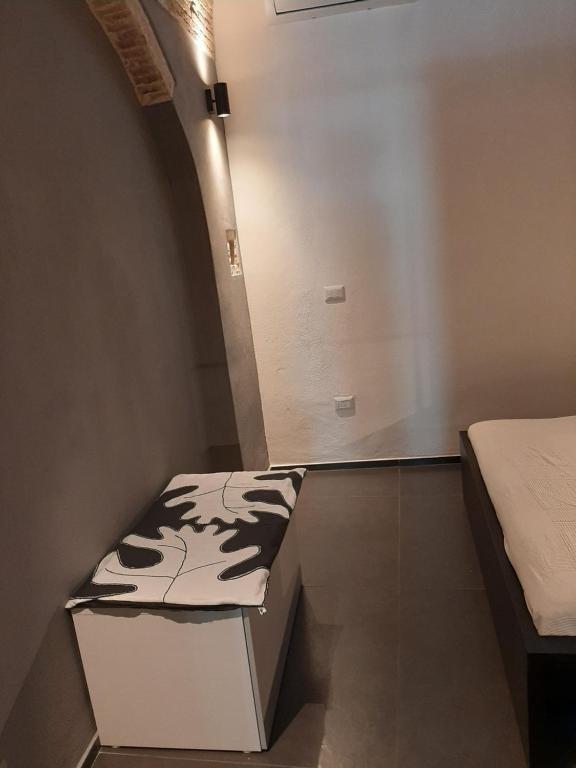 Postel nebo postele na pokoji v ubytování Urban79