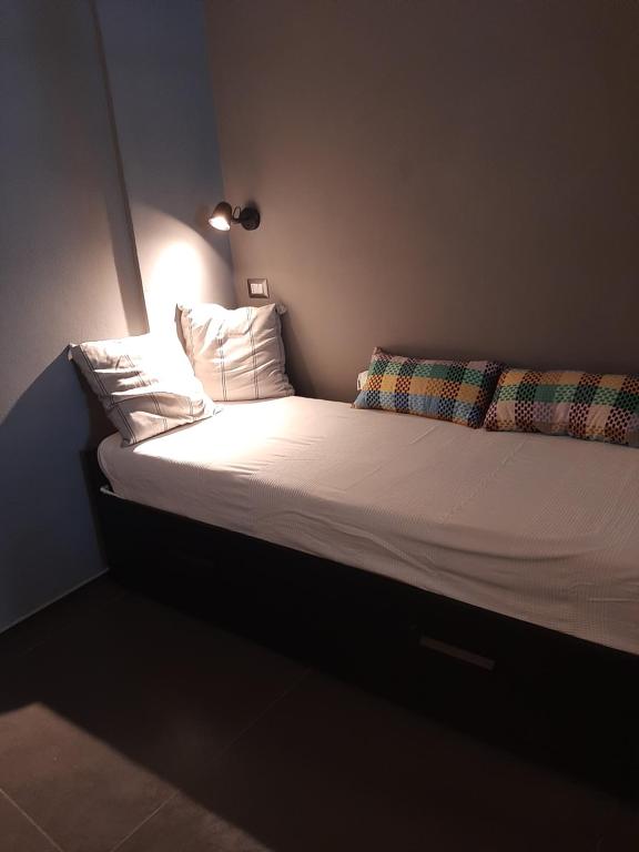 Postel nebo postele na pokoji v ubytování Urban79