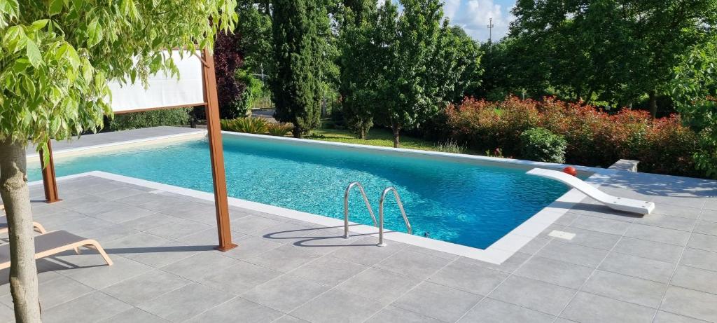 Bazén v ubytování Oltre la Siepe Apartment nebo v jeho okolí