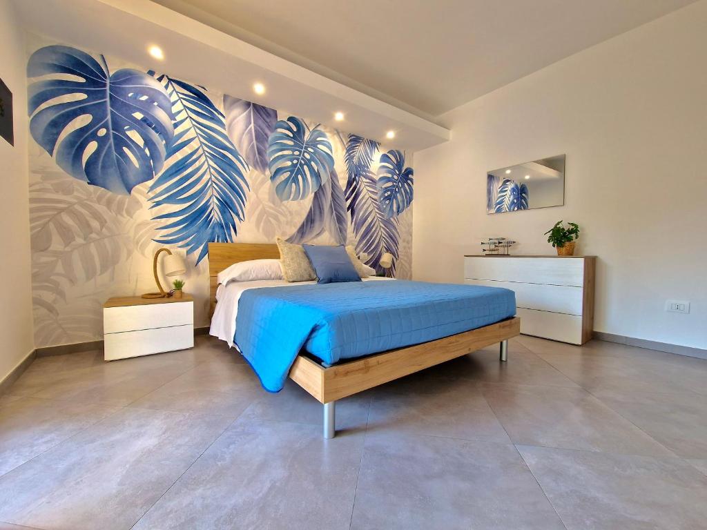 Postel nebo postele na pokoji v ubytování TraMonti Apartments Pescara