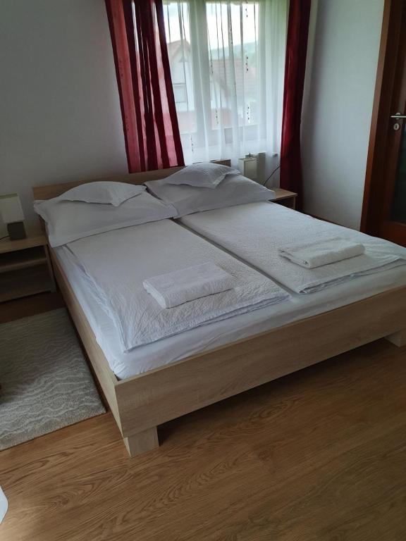 Postel nebo postele na pokoji v ubytování Casa Toth