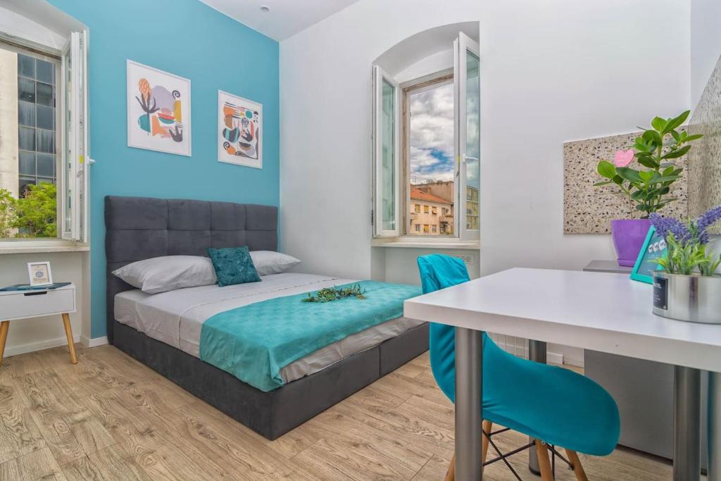 Una cama o camas en una habitación de Style Room Freedom