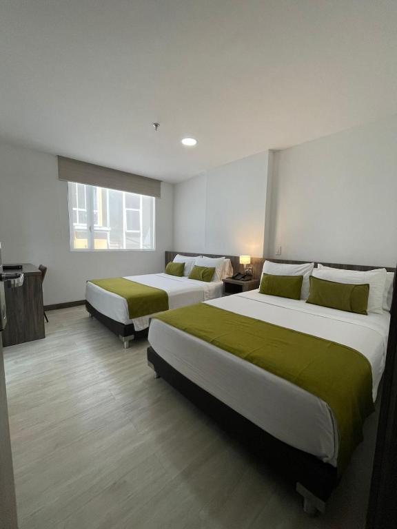 Postel nebo postele na pokoji v ubytování Hotel Santiago de Arma