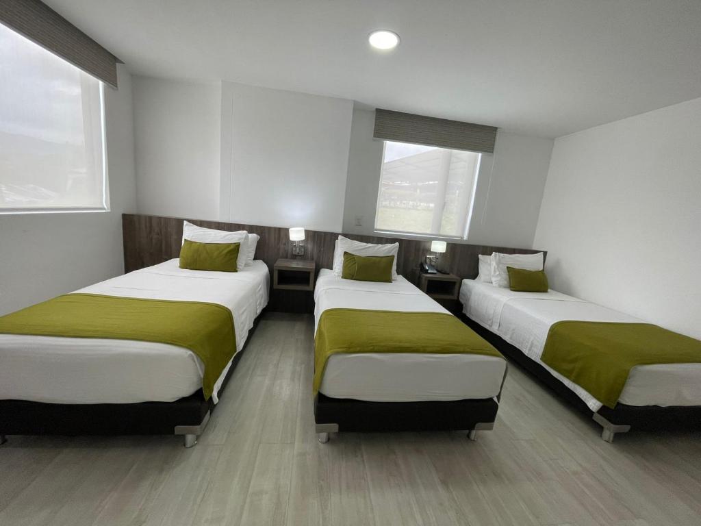 Postel nebo postele na pokoji v ubytování Hotel Santiago de Arma