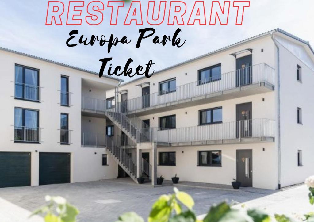a large white building with the words retirement apartment enclave park ticket at Black Forest Hotel Kappel-Grafenhausen in Kappel-Grafenhausen