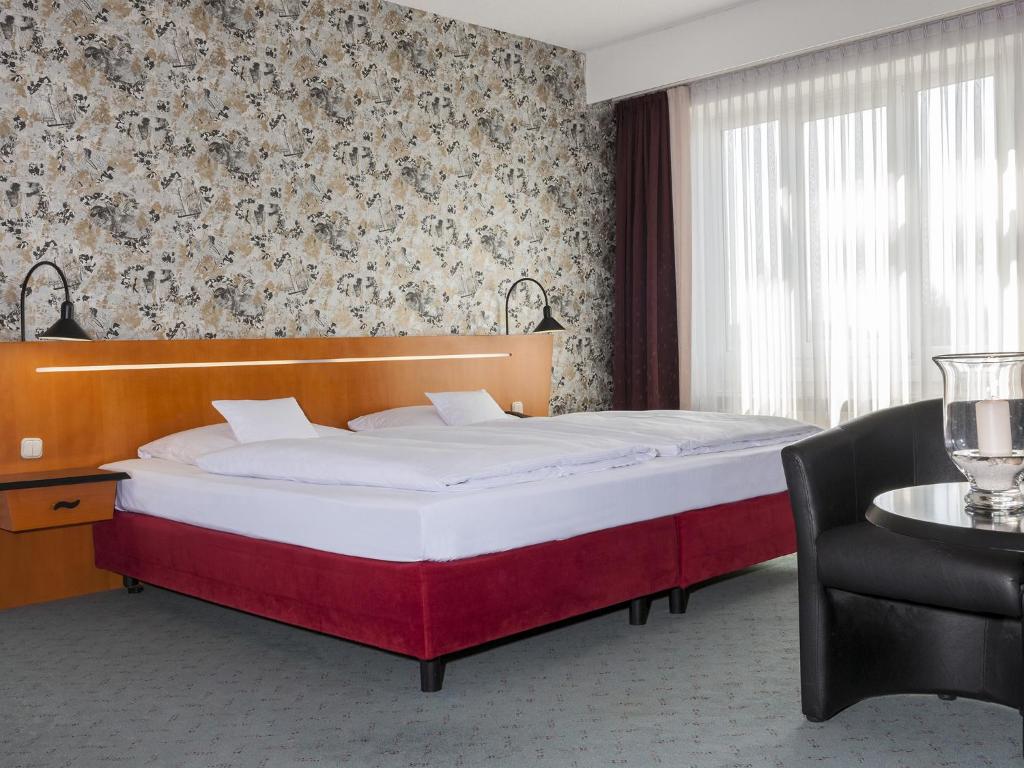 Postel nebo postele na pokoji v ubytování Good Morning + Leipzig