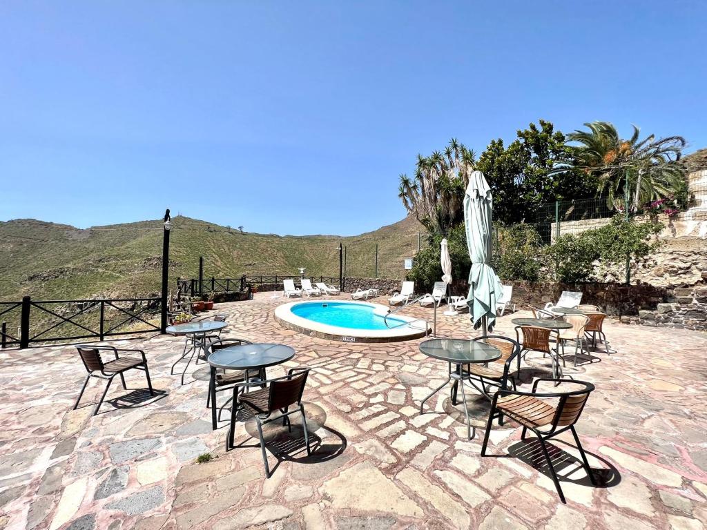 Fotografie z fotogalerie ubytování Apto en caserío rural con cocina, piscina, Wifi, barbacoa y jardín compartidos v destinaci San Miguel de Abona