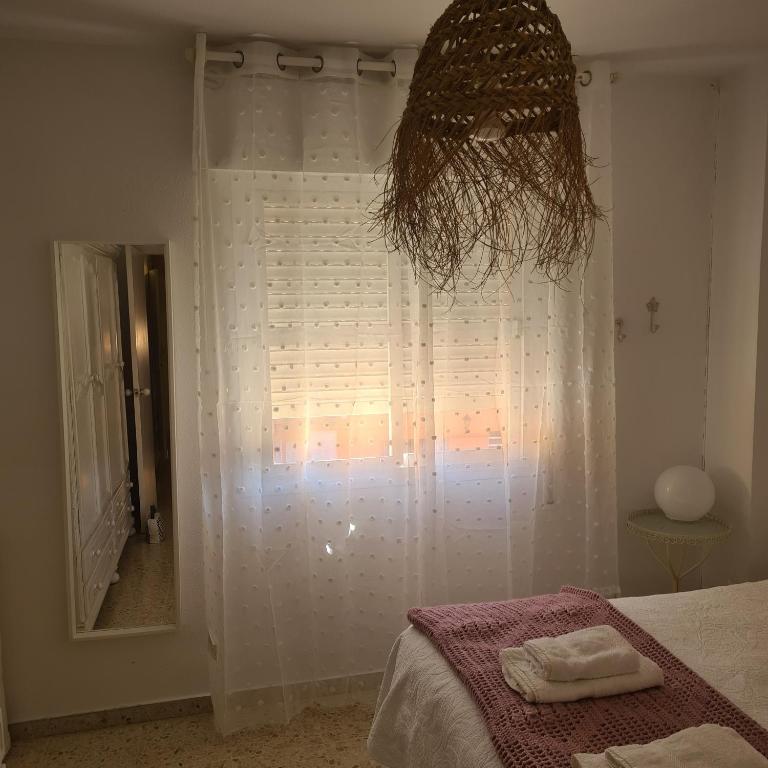 Posteľ alebo postele v izbe v ubytovaní Apartamento Avenida Andalucía Plaza