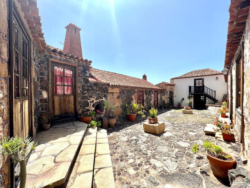 Fotografie z fotogalerie ubytování Apto en caserío rural con cocina, piscina, Wifi, barbacoa y jardín compartidos v destinaci San Miguel de Abona