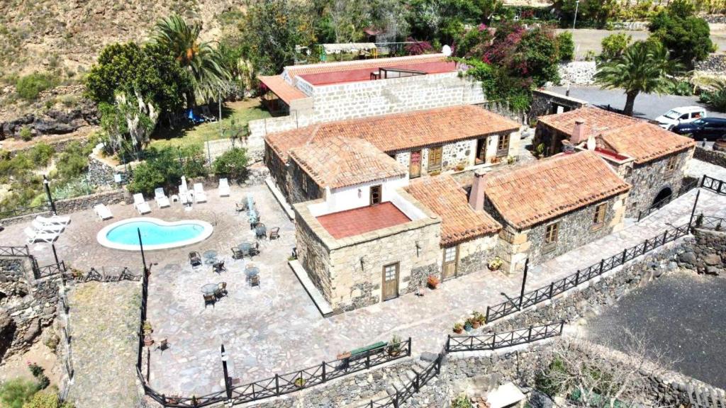 Fotografie z fotogalerie ubytování Apto en caserío rural con cocina, piscina, Wifi, barbacoa y jardín compartidos v destinaci San Miguel de Abona