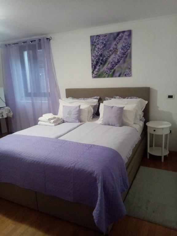 Postel nebo postele na pokoji v ubytování Rooms Serafin