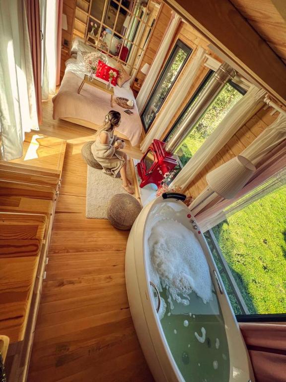 Postel nebo postele na pokoji v ubytování Vagona Tiny House