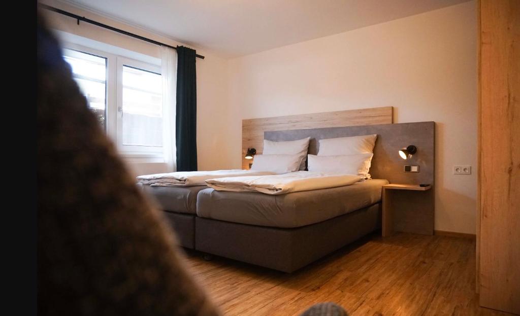 Postel nebo postele na pokoji v ubytování Hotel verWeiler