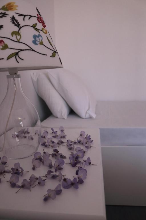 Łóżko lub łóżka w pokoju w obiekcie Hotel Theopisti