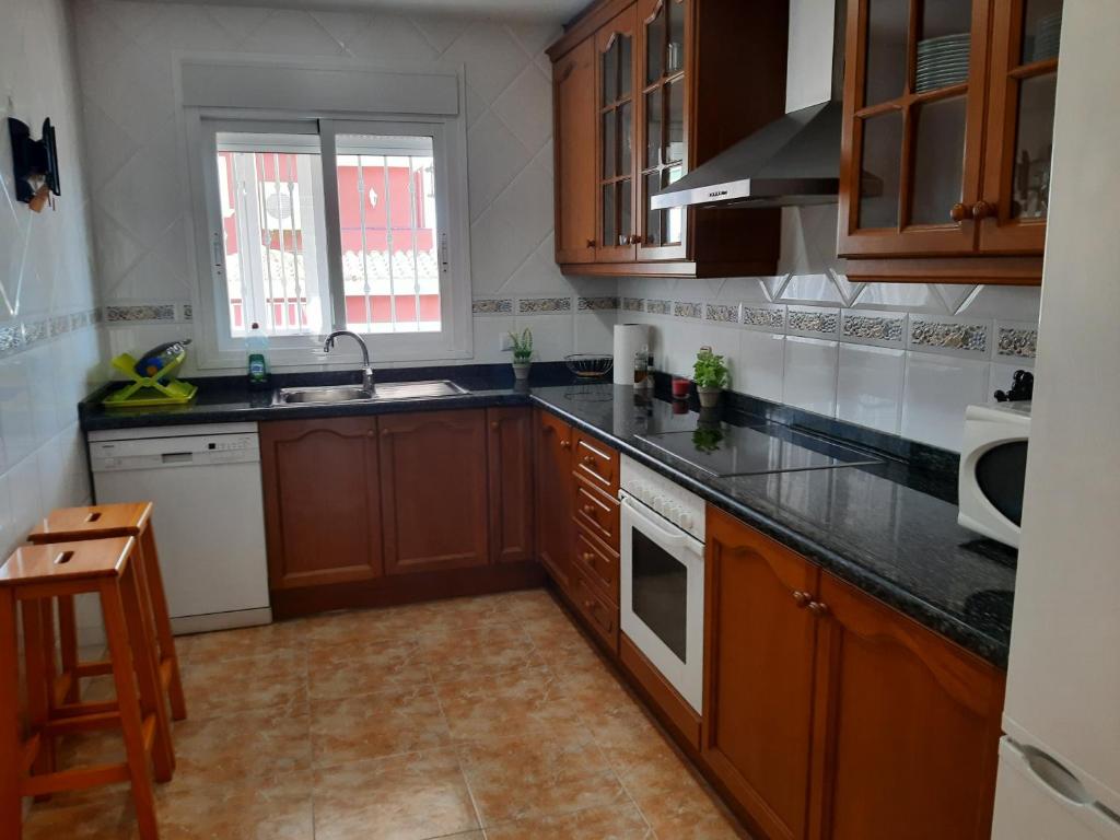 Kuchyň nebo kuchyňský kout v ubytování URBANIZACION MIRAMAR PENISCOLA