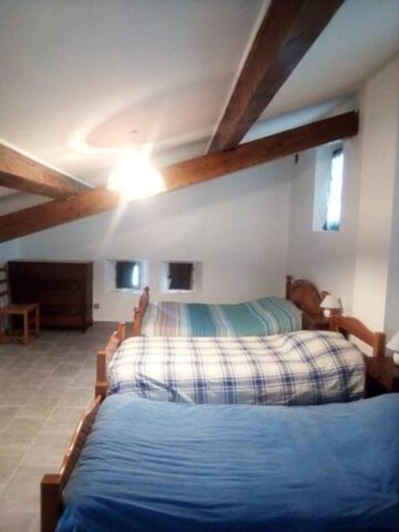 Postel nebo postele na pokoji v ubytování Le mas de Duan
