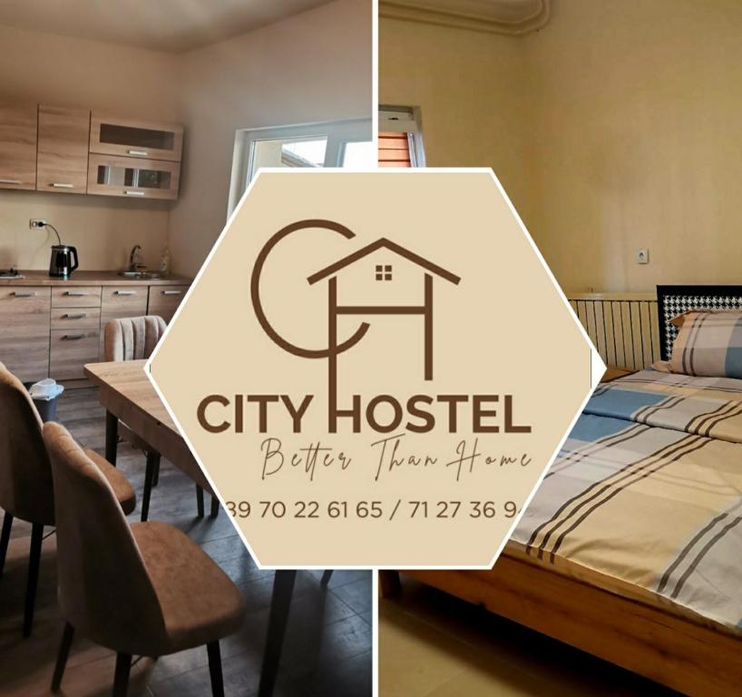 a room with a bed and a sign that says city hostel better than home at City Hostel in Skopje