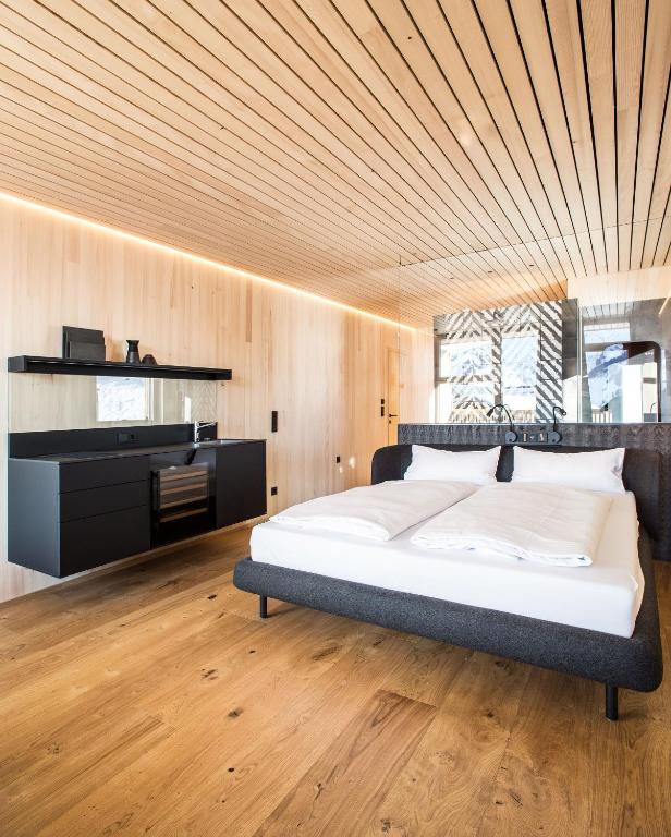 Postel nebo postele na pokoji v ubytování HOLZGAUER HAUS