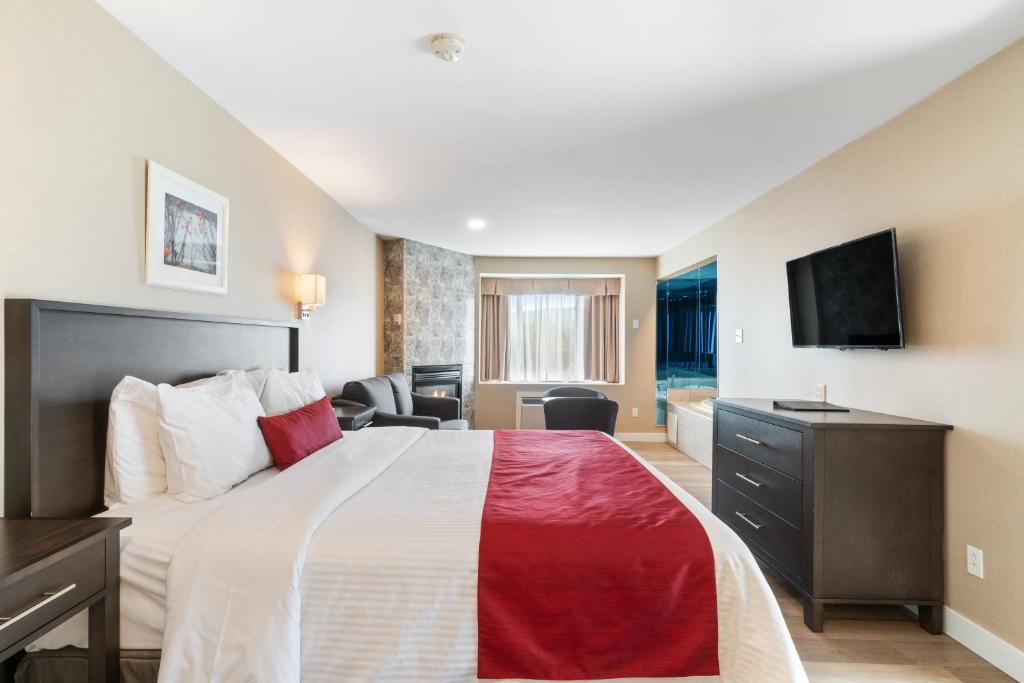 TV a/nebo společenská místnost v ubytování Hotel Bromont