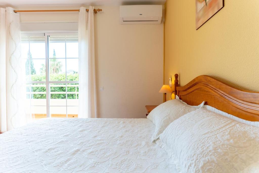 Postel nebo postele na pokoji v ubytování Casa San José