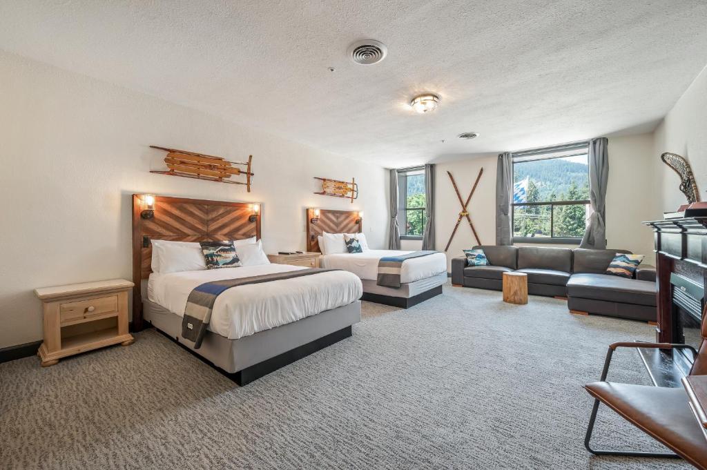 Postel nebo postele na pokoji v ubytování Hotel Leavenworth