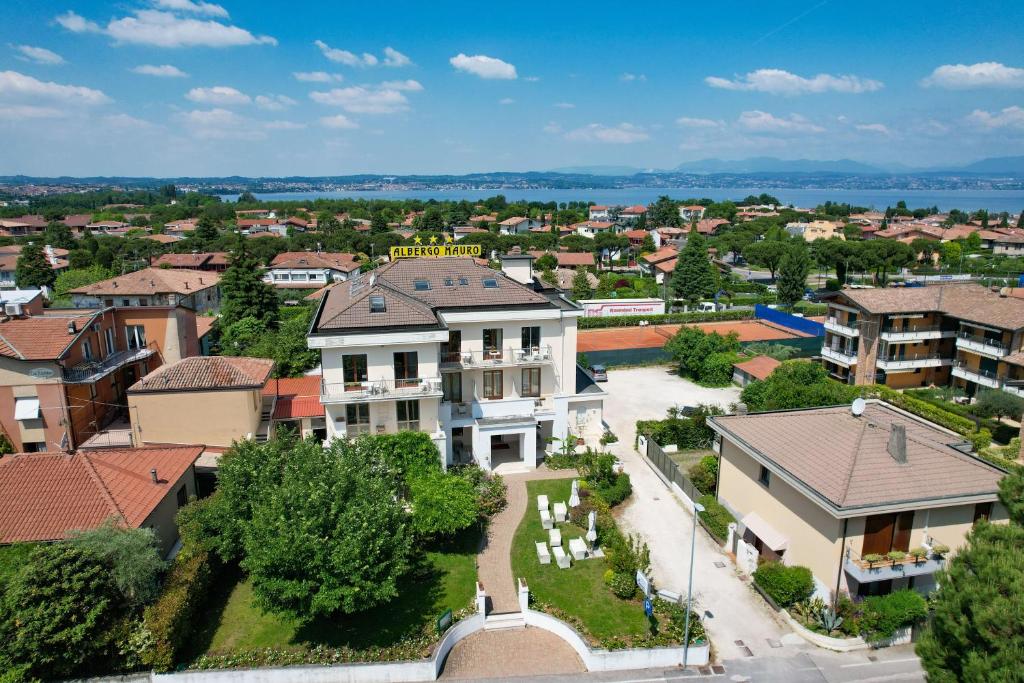 an aerial view of a building in a city at Hotel Mauro in Sirmione