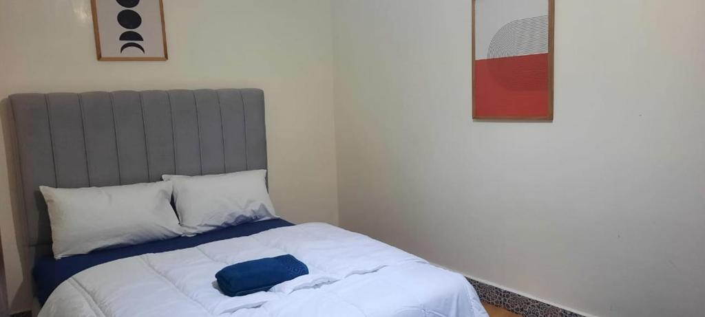 Postel nebo postele na pokoji v ubytování Akwaba lodge