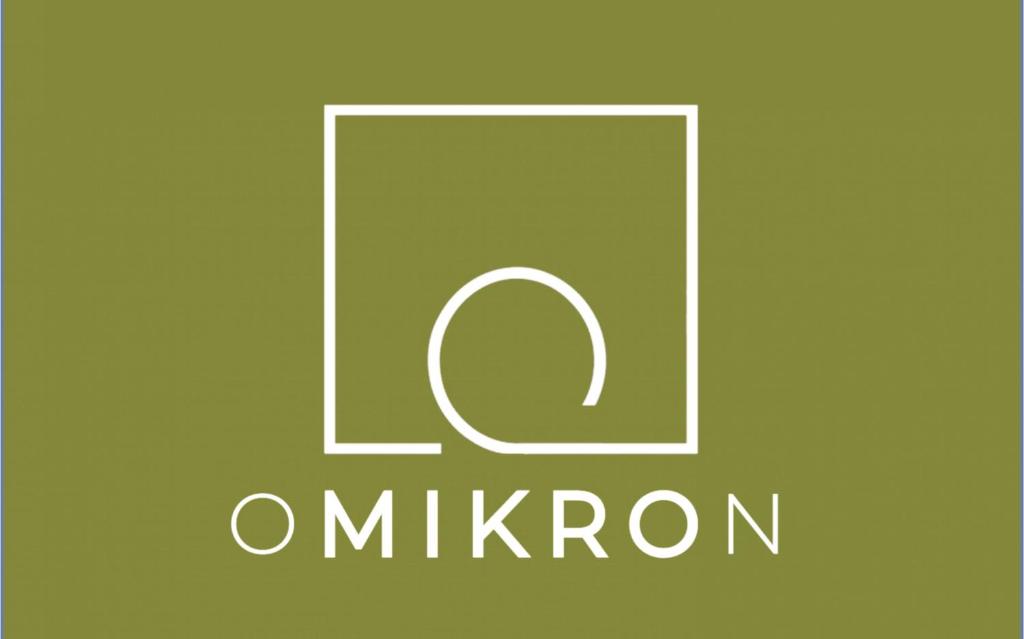 a green square with the letter c and the word autumn at Omikron in Mikro