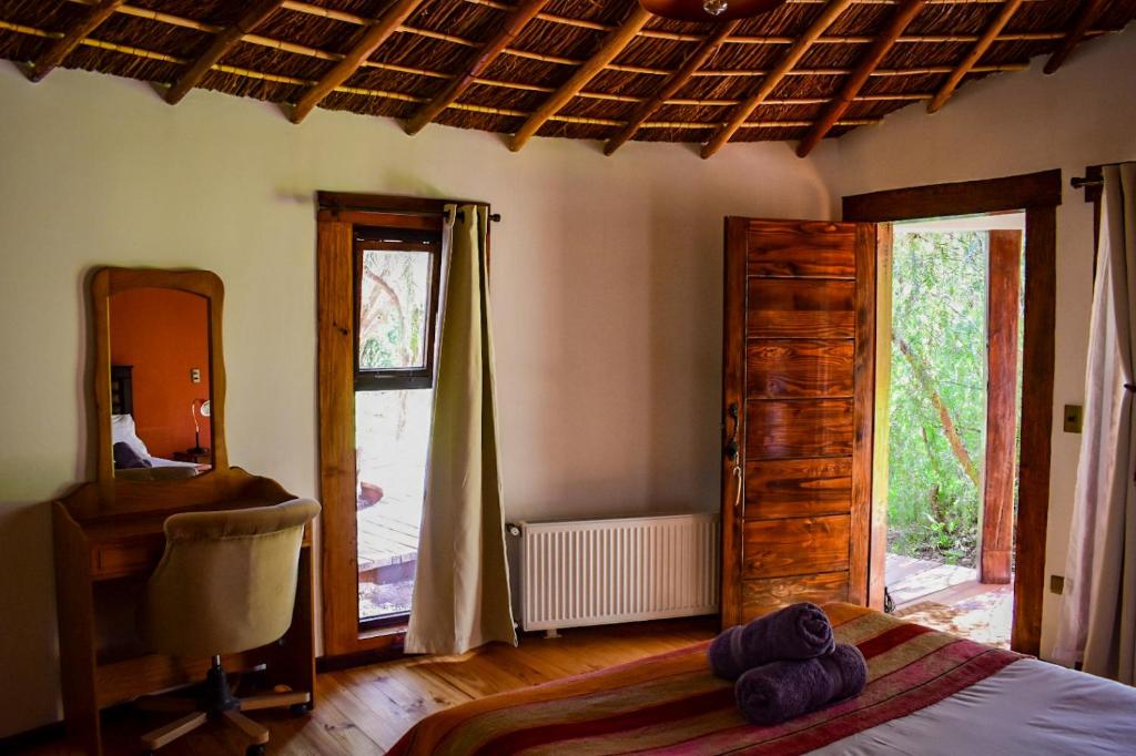 Postel nebo postele na pokoji v ubytování Lodge Atacama Horse