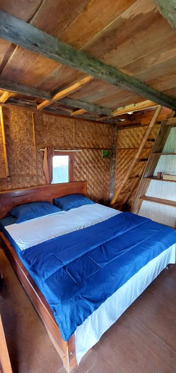 Postel nebo postele na pokoji v ubytování Second Home Bungalows