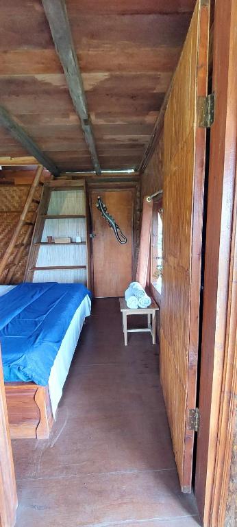 Postel nebo postele na pokoji v ubytování Second Home Bungalows