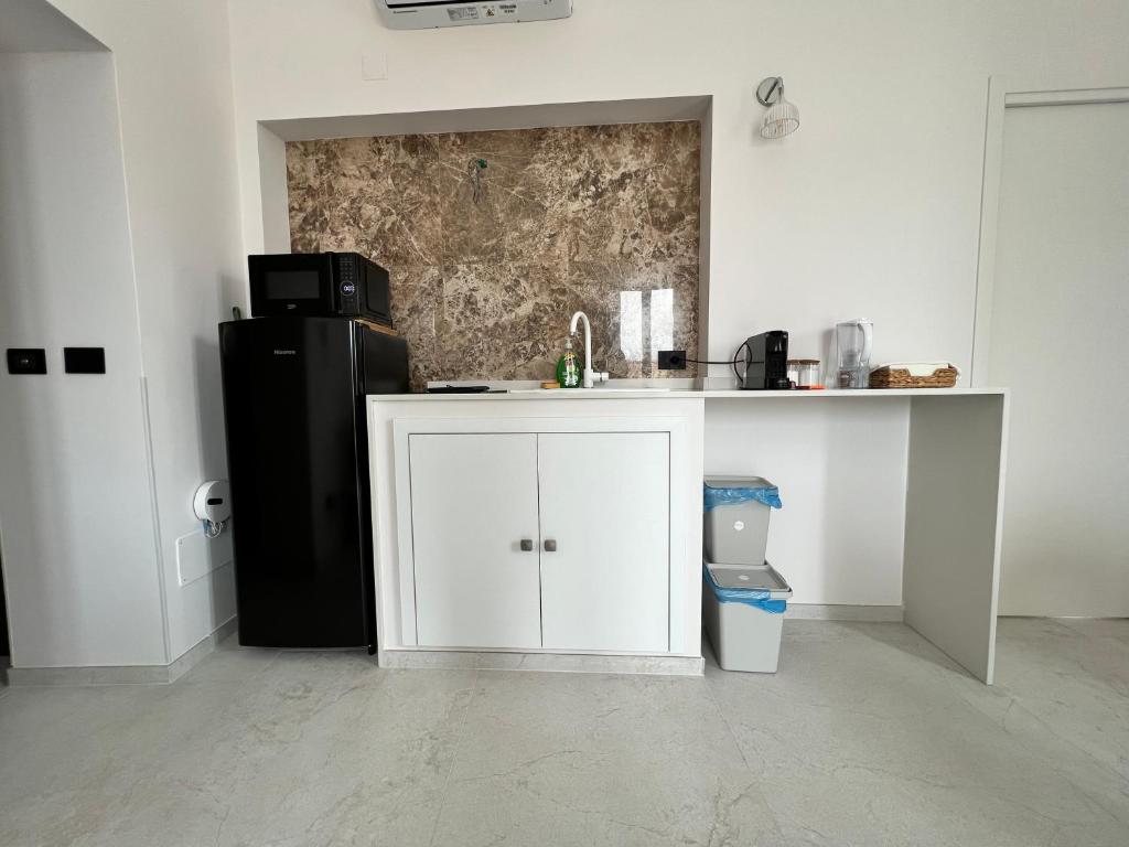 Kuchyňa alebo kuchynka v ubytovaní La Casa Di Chloe