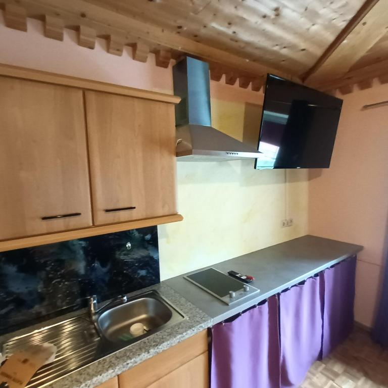 Kuchyň nebo kuchyňský kout v ubytování Zimmer und Appartement Marktcafe Sankt Peter am Kammersberg 87