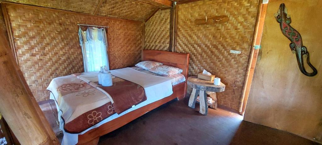 Postel nebo postele na pokoji v ubytování Second Home Bungalows