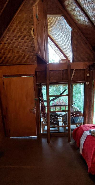 Postel nebo postele na pokoji v ubytování Second Home Bungalows