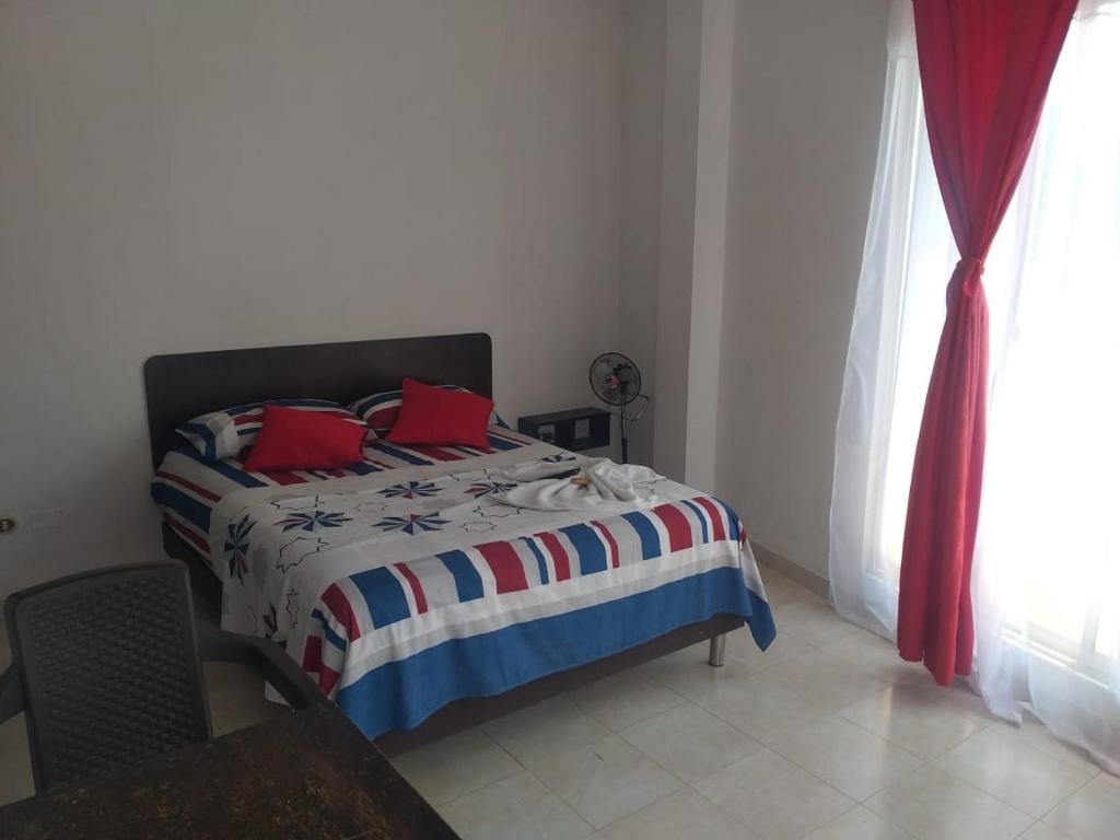 Postel nebo postele na pokoji v ubytování Hotel Luis Ángel