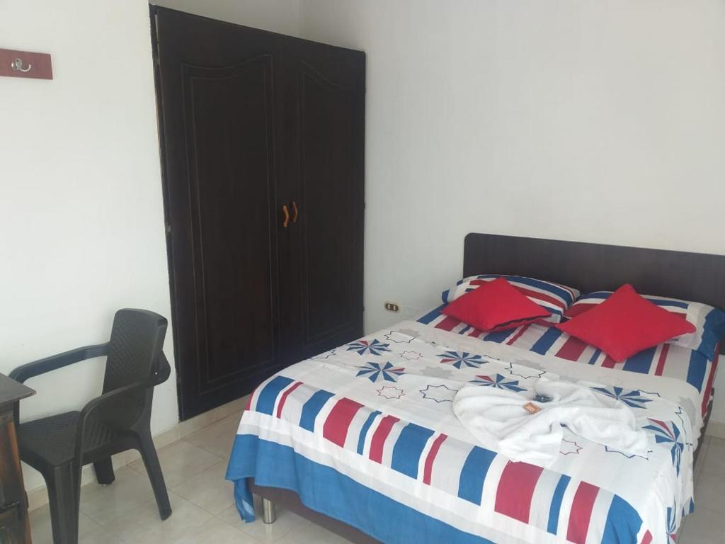 Postel nebo postele na pokoji v ubytování Hotel Luis Ángel