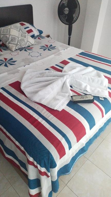 Postel nebo postele na pokoji v ubytování Hotel Luis Ángel