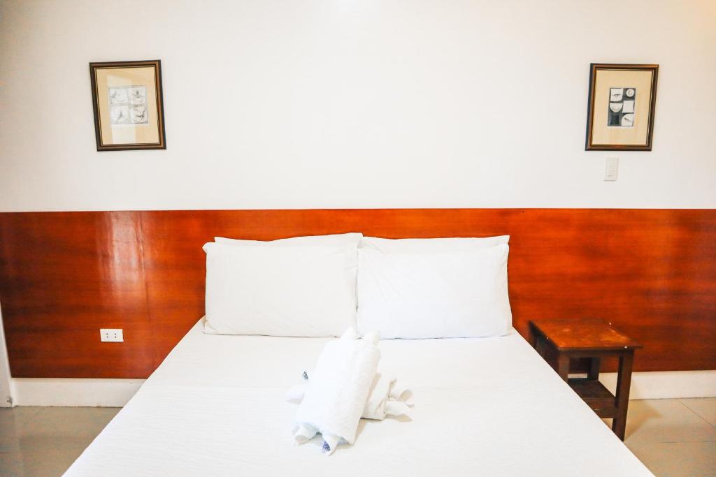 Postel nebo postele na pokoji v ubytování Youhan Beach Resort