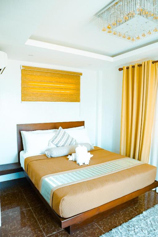 Postel nebo postele na pokoji v ubytování Youhan Beach Resort