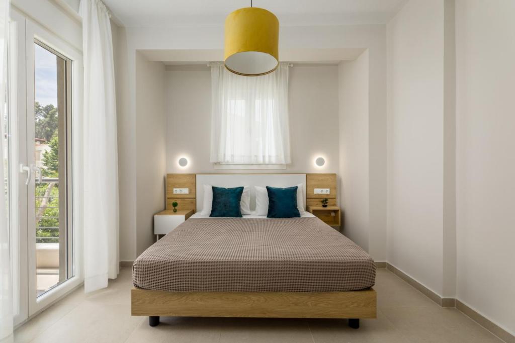 Postel nebo postele na pokoji v ubytování V Luxury Apartments with Pool