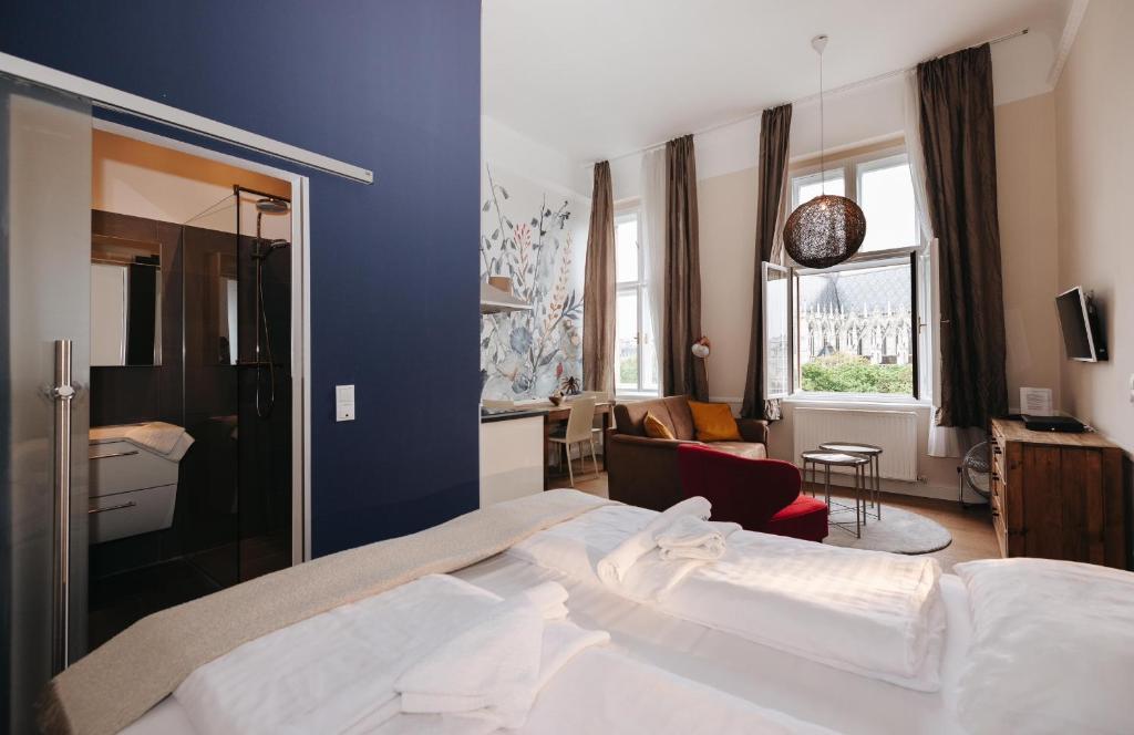 Posteľ alebo postele v izbe v ubytovaní KH Apartments Universitaet